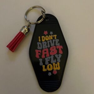 Chic Black Key Holder with Red Tassel